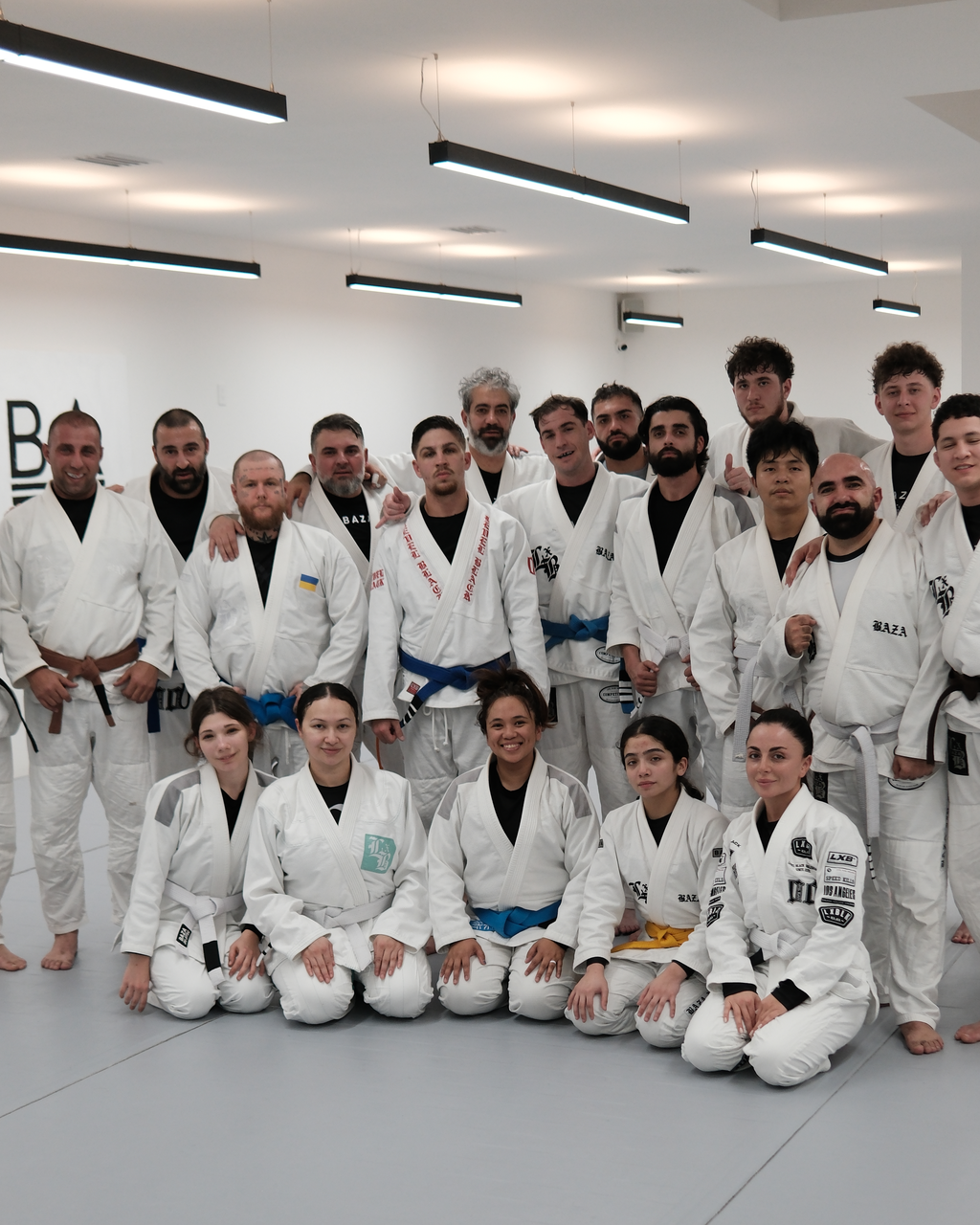 BAZA students together on the mat after a training session